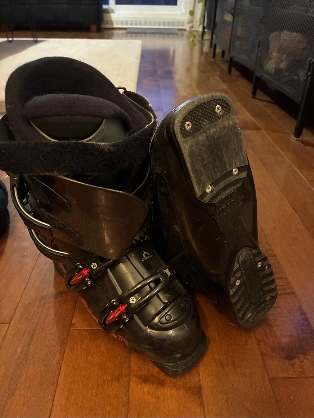Rossignol Black Ski Boots with Red Buckle Accents